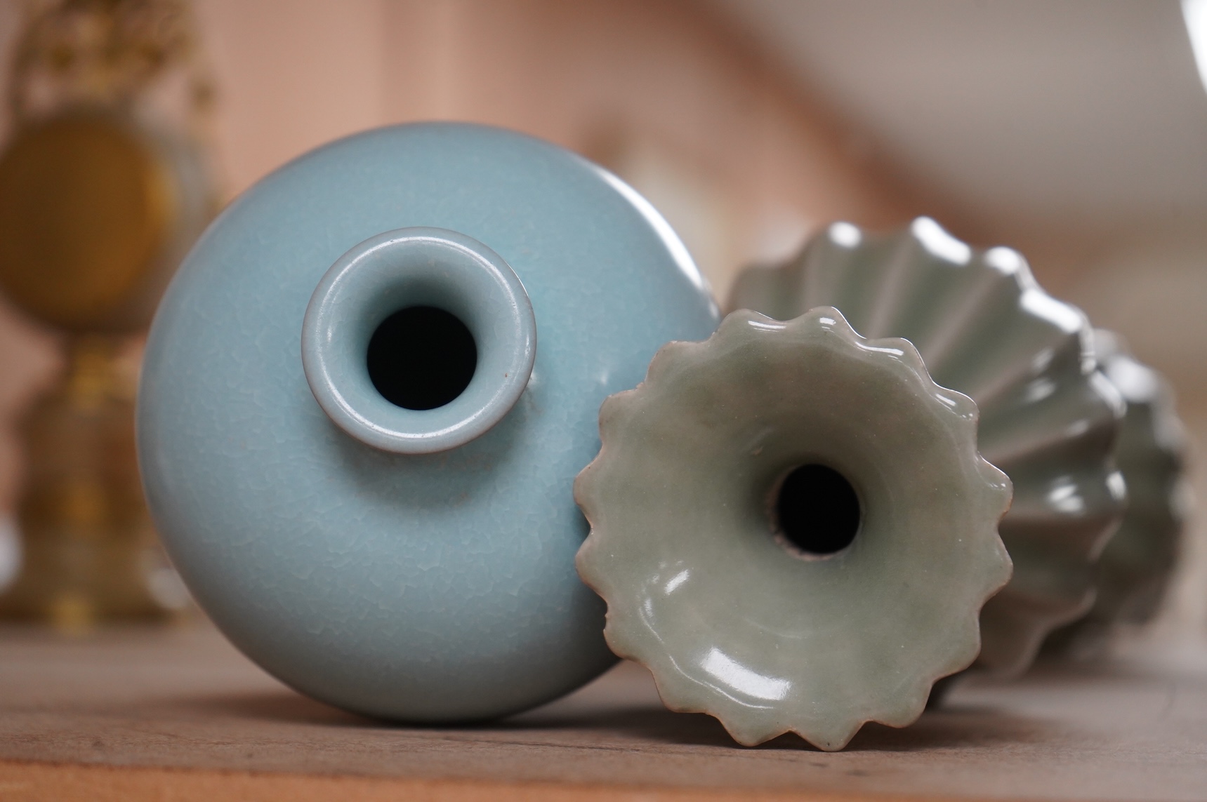 Two Chinese vases comprising a Meiping example and a celadon glazed example, largest 18cm high